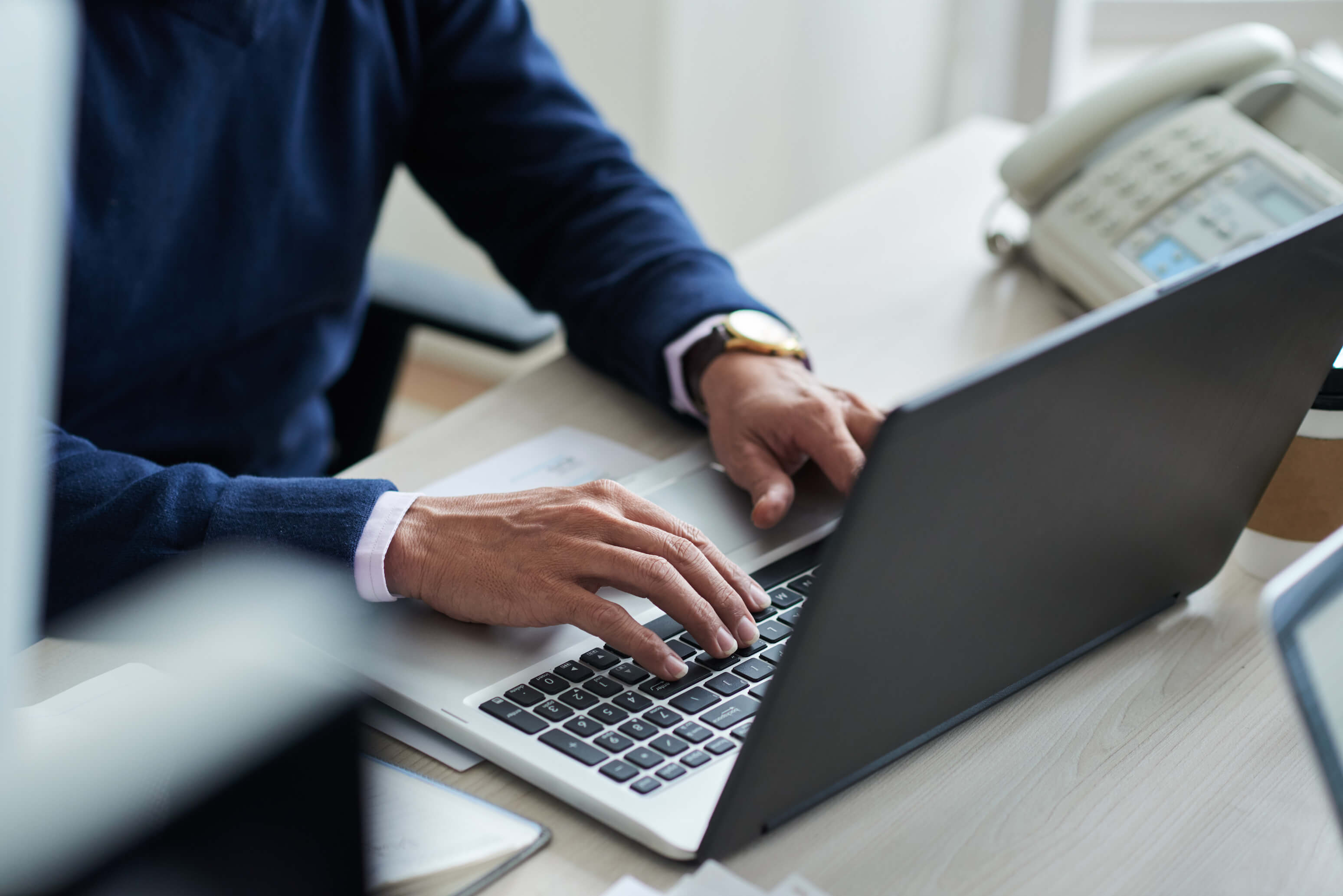 A photo of a client having an online meeting with RS1 Project